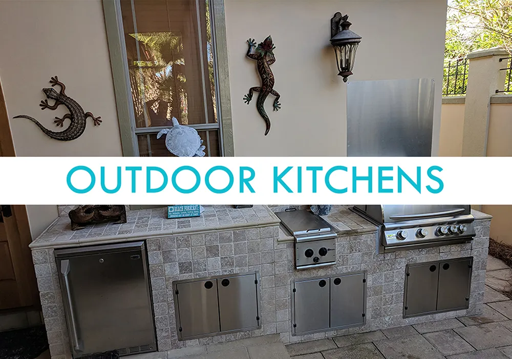 Outdoor kitchen featuring stainless steel appliances, stone countertop, decorative lizards, and a wall-mounted lantern, showcasing home improvement options for outdoor living spaces.