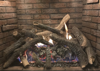 fireplace with lifelike wood pensacola doodlebuggers destin
