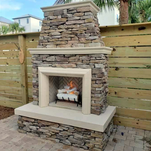 outdoor gas burning fireplace installation in Perdido Key, FL
